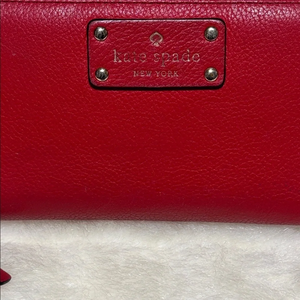 Kate Spade Red Pebbled Leather Zip Around Wallet with Logo Plate